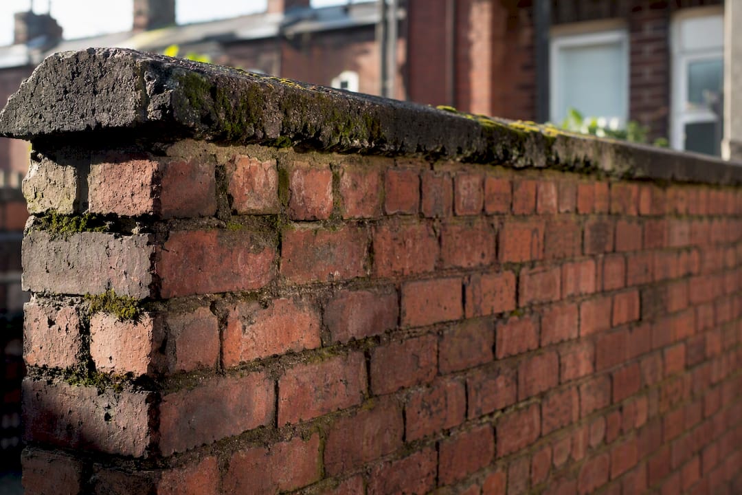 Close-up of solid brick wall on Liverpool Victorian terrace